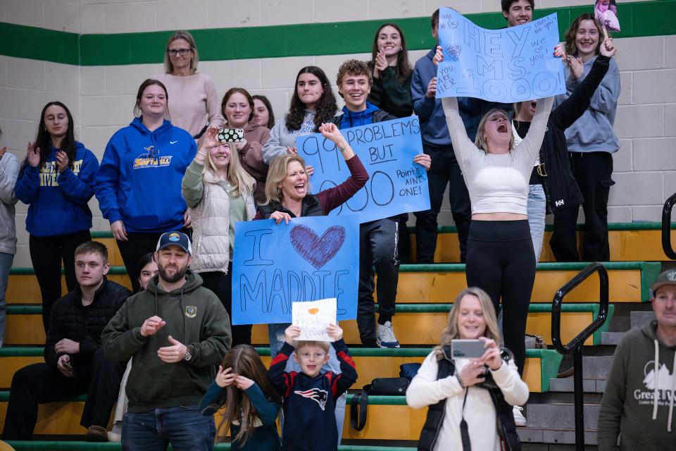 West Boylston fans cheer after Maddie Pitro scored her 1,000th point during the Clinton Holiday Tournament on Friday.