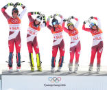 <p>Gold medallists Switzerland with (L-R) Ramon Zenhaeusern, Daniel Yule, Luca Aerni, Wendy Holdener and Denise Feierabend celebrate during the victory ceremony for the Alpine Team Event Big Final on day 15 of the PyeongChang 2018 Winter Olympic Games at Yongpyong Alpine Centre on February 24, 2018 in Pyeongchang-gun, South Korea. (Photo by Tom Pennington/Getty Images) </p>