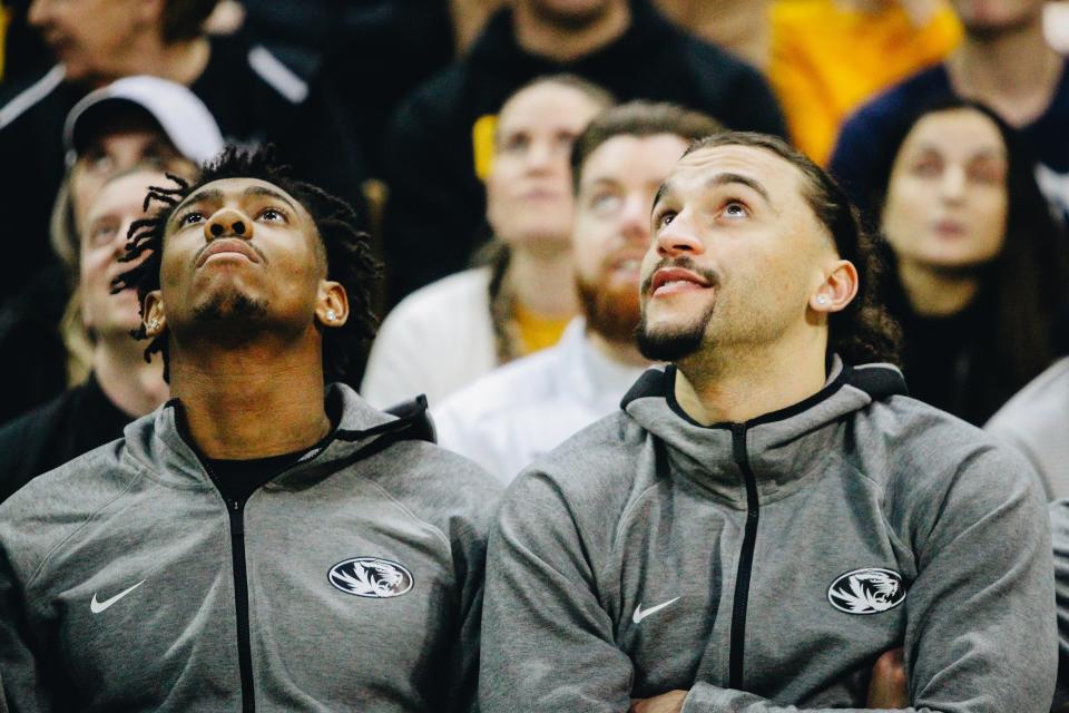 Missouri men's basketball players DeAndre Gholston (left) and Tre Gomillion (right) await their tournament destination during Missouri's NCAA Selection Show watch party on March 12, 2023, at Mizzou Arena.