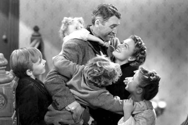 <p>Everett</p> At center, Jimmy Stewart and Donna Reed in ‘It’s a Wonderful Life’