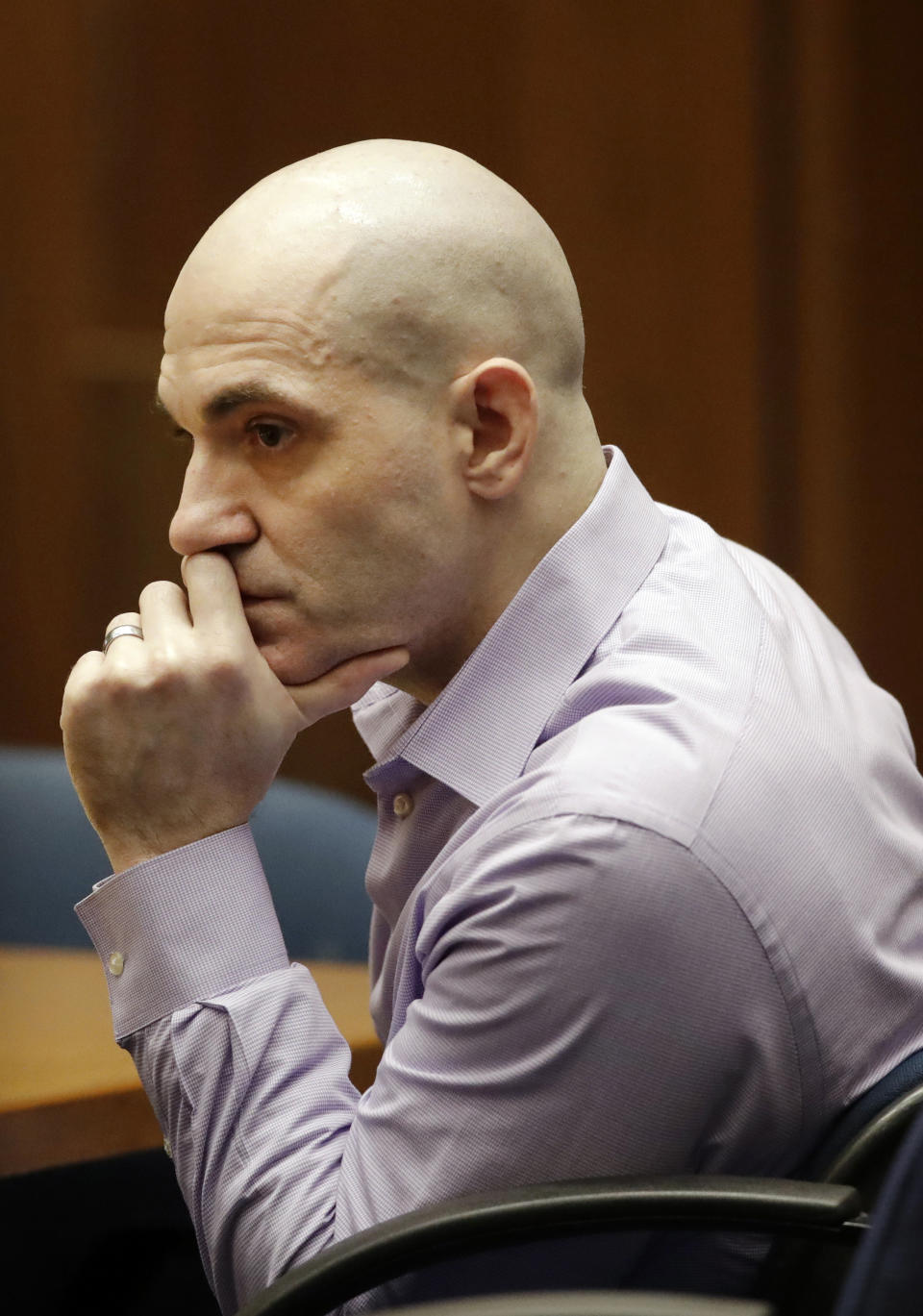 Michael Gargiulo listens to his attorney's closing arguments during the trial of People vs. Michael Gargiulo Wednesday, Aug. 7, 2019, in Los Angeles. Closing arguments continued Wednesday in the trial of the air conditioning repairman charged with killing two Southern California women and attempting to kill a third. (AP Photo/Marcio Jose Sanchez, Pool)