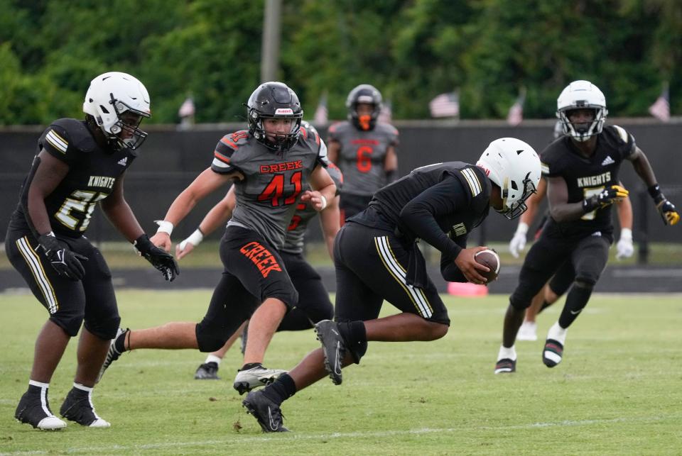 Spruce Creek Andrew Halleran (41) gives chase during spring game with Oakleaf at Spruce Creek High School in Port Orange, Friday, May 26, 2023. 