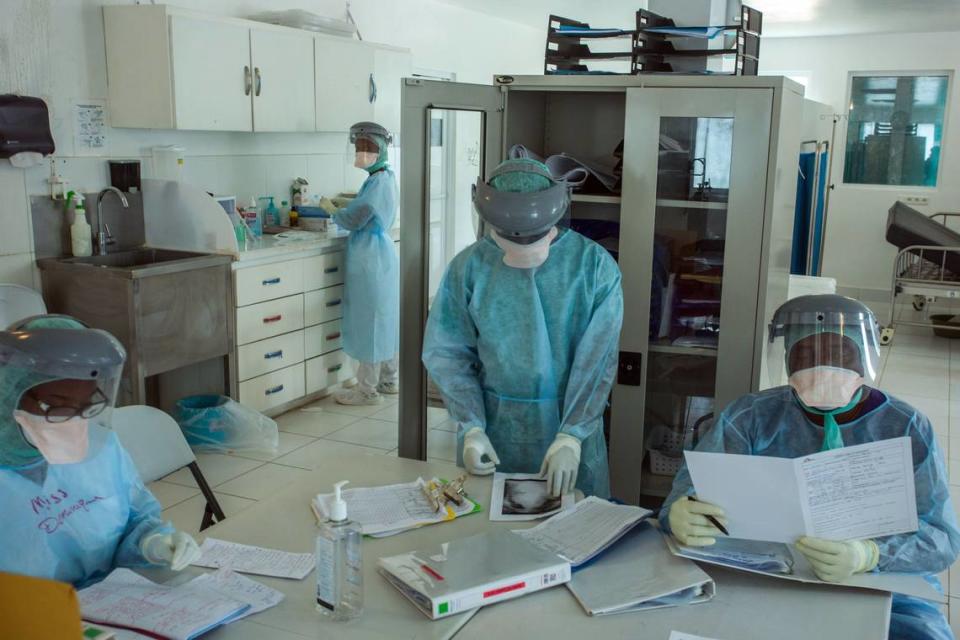 A team from the Doctors Without Borders Drouillard Hospital in Cite Soleil, Haiti, works in the COVID-19 patient care area on June 3, 2020.