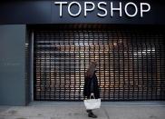 FILE PHOTO: Closed branch of Topshop seen, after the British online fashion retailer ASOS said it has bought the brand amongst others from the collapsed Arcadia group, London, Britain