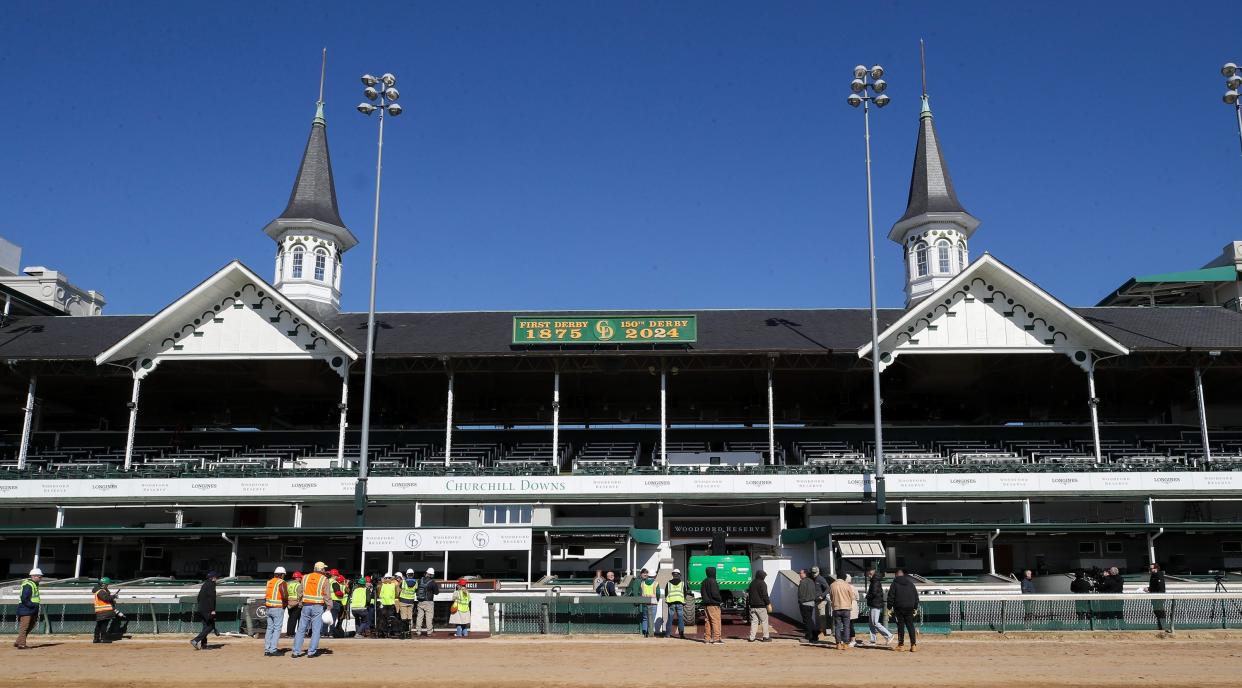 The sign signaling it's the 150th Running of the Kentucky Derby and "2024" are changed at Churchill Downs on Tuesday, March 19, 2024