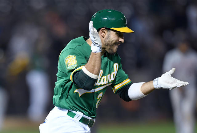 Ramon Laureano made an insane throw from the warning track in center field to first base on Saturday night against the Angels to complete the double play. (Getty Images)