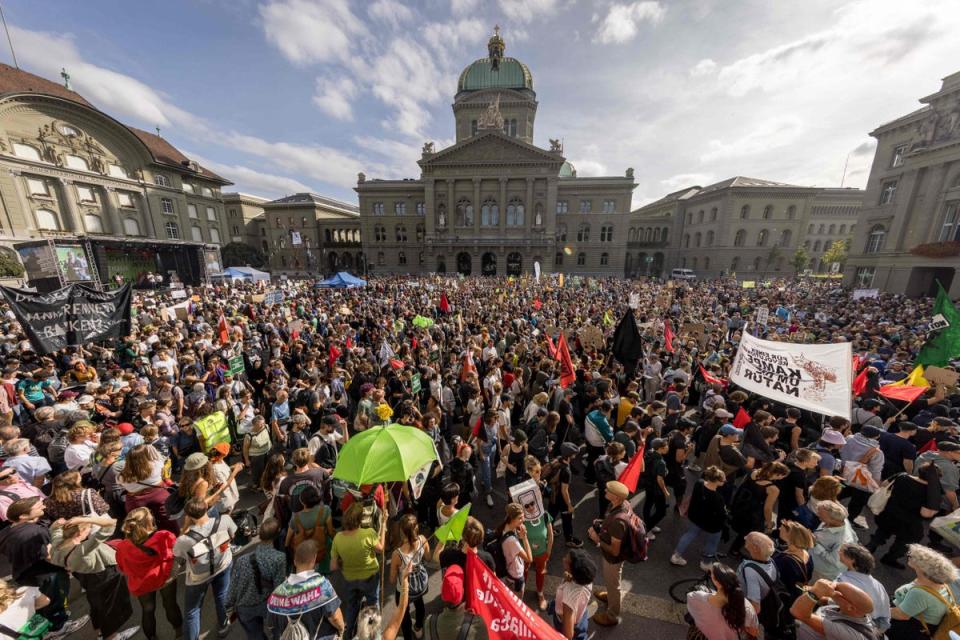 Demonstrators during a national protest for climate justice in Bern, Switzerland, on September 30, 2023 (AFP via Getty Images)