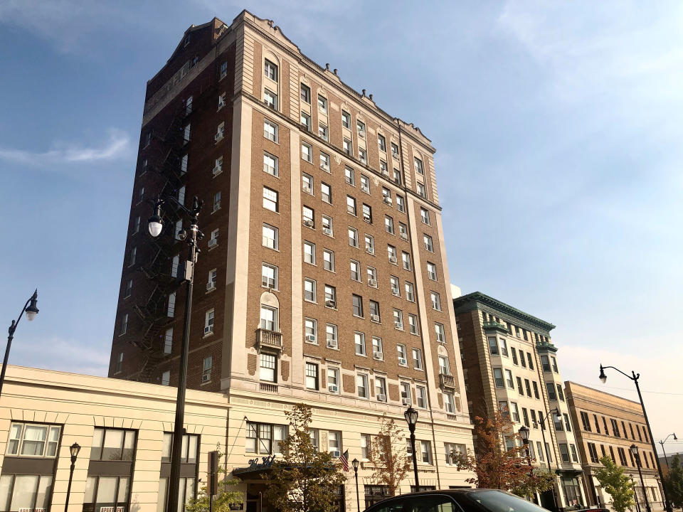 FILE - An exterior of the former St. Nicholas Hotel, now an apartment complex, in downtown Springfield, Ill., Oct. 8, 2020. Illinois Secretary of State Paul Powell had a suite on the fifth floor where he left nearly $800,000 in cash, some in shoeboxes, when he died. For more than half a century, a Powell-established $250,000 trust sustained his legacy, for better or worse. But the account that maintained his birthplace as a museum will soon run dry. (AP Photo/John O'Connor, File)