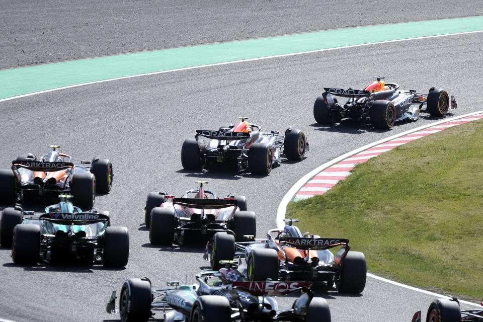 Red Bull driver Max Verstappen, top right, of the Netherlands leads the field shortly after the start of the Japanese Formula One Grand Prix at the Suzuka Circuit in Suzuka, central Japan, Sunday, April 7, 2024. (AP Photo/Hiro Komae)