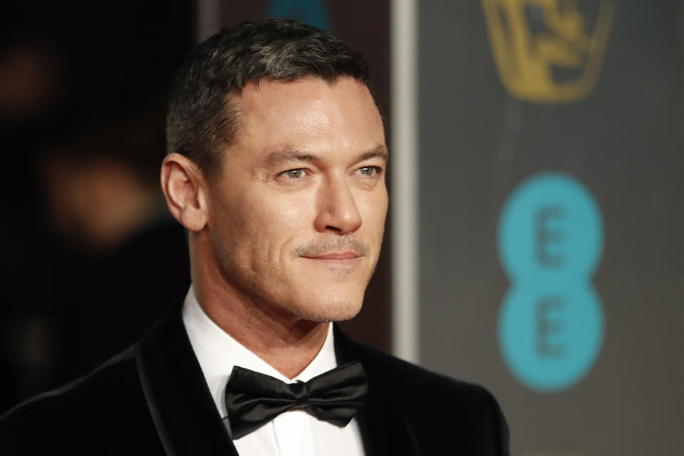 Luke Evans poses on the red carpet upon arrival at the BAFTA Film Awards at the Royal Albert Hall on February 10, 2019. (Photo by Tolga Akmen/AFP via Getty Images)