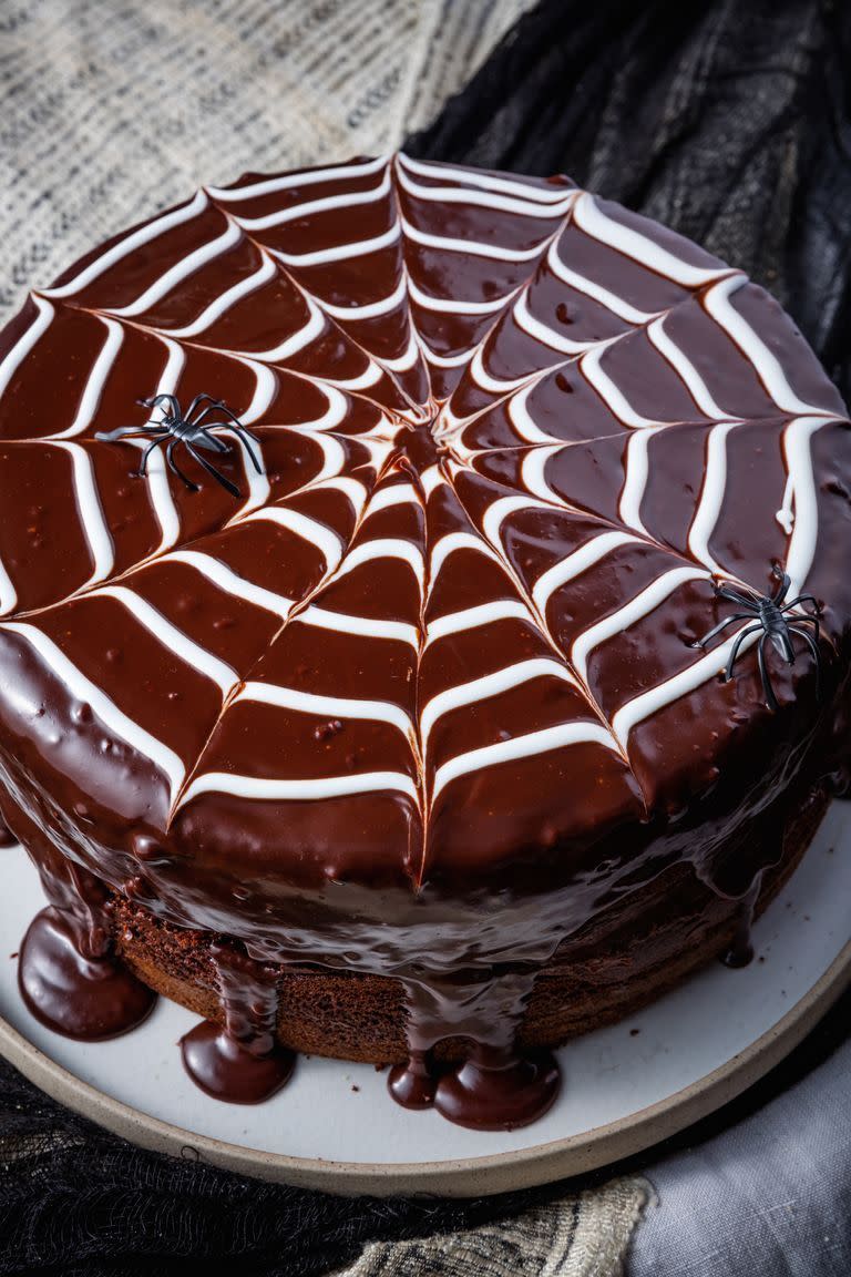 <p>Nothing is going to come between us and chocolate cake. Not even spiders.</p><p>Get the <a href="https://www.delish.com/uk/cooking/recipes/a29221409/spiderweb-cake-recipe/" rel="nofollow noopener" target="_blank" data-ylk="slk:Spiderweb Cake;elm:context_link;itc:0;sec:content-canvas" class="link ">Spiderweb Cake</a> recipe.</p>