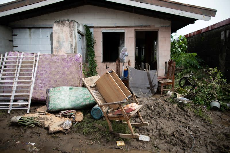 Houses filled with mud following floods caused by Typhoon Goni in Batangas City