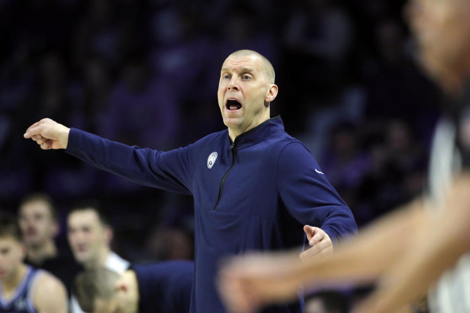 BYU head coach Mark Pope reacts during the first half of an NCAA college basketball game against Kansas State, Saturday, Feb. 24, 2024, in Manhattan, Kan. (AP Photo/Colin E. Braley)