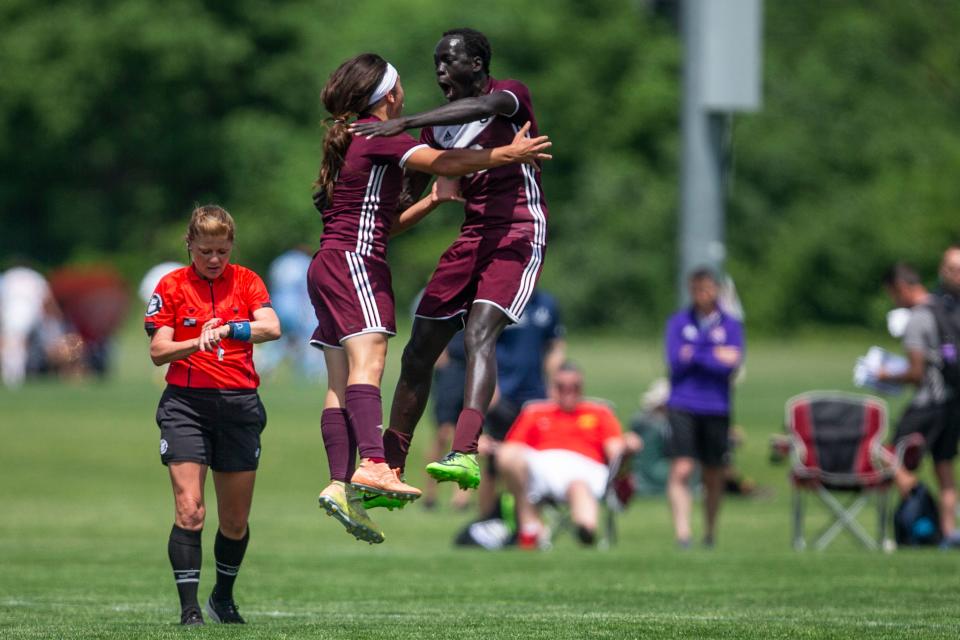 Western Christian's Miles Baccam and Uchan Harberts celebrate a goal during the Class 1A quarterfinal in the Boys State Soccer Tournament between Burlington Notre Dame and Western Christian, on Wednesday, June 1, 2022, at the Cownie Soccer Complex, in Des Moines. 