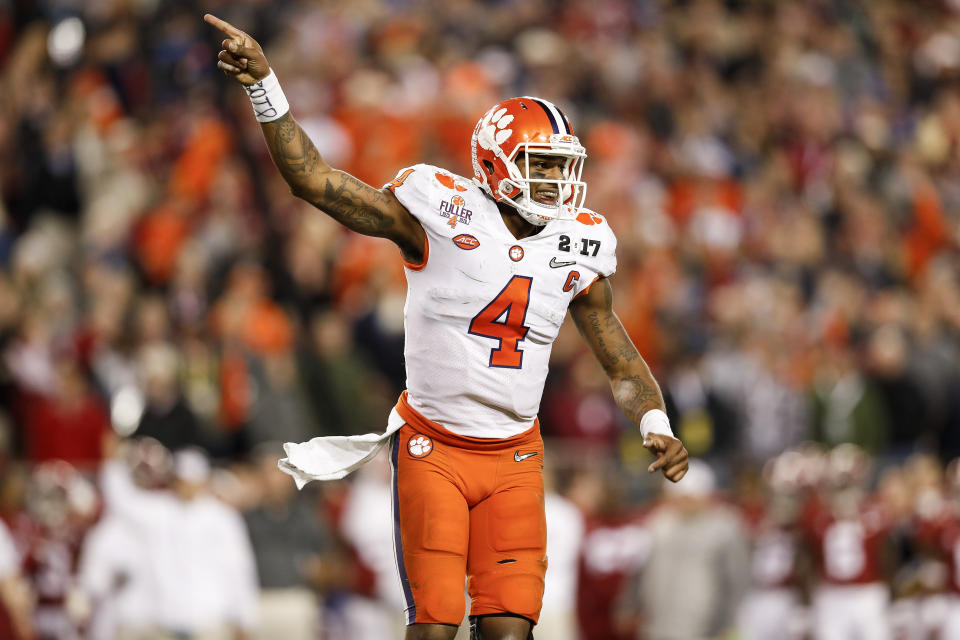 TAMPA, FL - JANUARY 09: Quarterback Deshaun Watson #4 of the Clemson Tigers celebrates after a touchdown during the 2017 College Football Playoff National Championship Game against the Alabama Crimson Tide at Raymond James Stadium on January 9, 2017 in Tampa, Florida. The Clemson Tigers defeated The Alabama Crimson Tide 35 to 31. (Photo by Don Juan Moore/Getty Images)