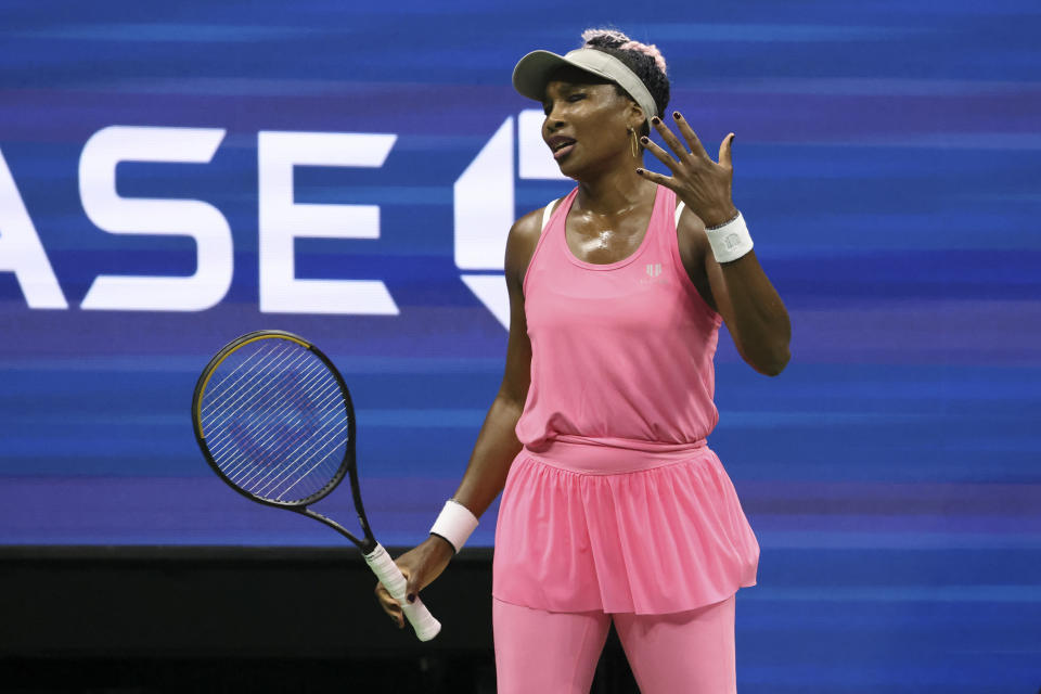 Venus Williams, of the United States, reacts during a match against Greet Minnen, of Belgium, at the first round of the U.S. Open tennis championships, Tuesday, Aug. 29, 2023, in New York. (AP Photo/Jason DeCrow)