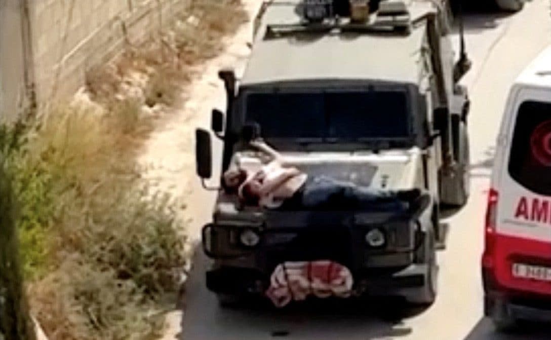 Palestinian man was tied to a jeep bonnet and driven through narrow roads following a counterterrorism operation where the man was injured