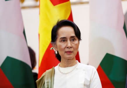 FILE PHOTO - Myanmar's State Counsellor Aung San Suu Kyi attends a signing ceremony in Hanoi, Vietnam April 19, 2018. REUTERS/Kham