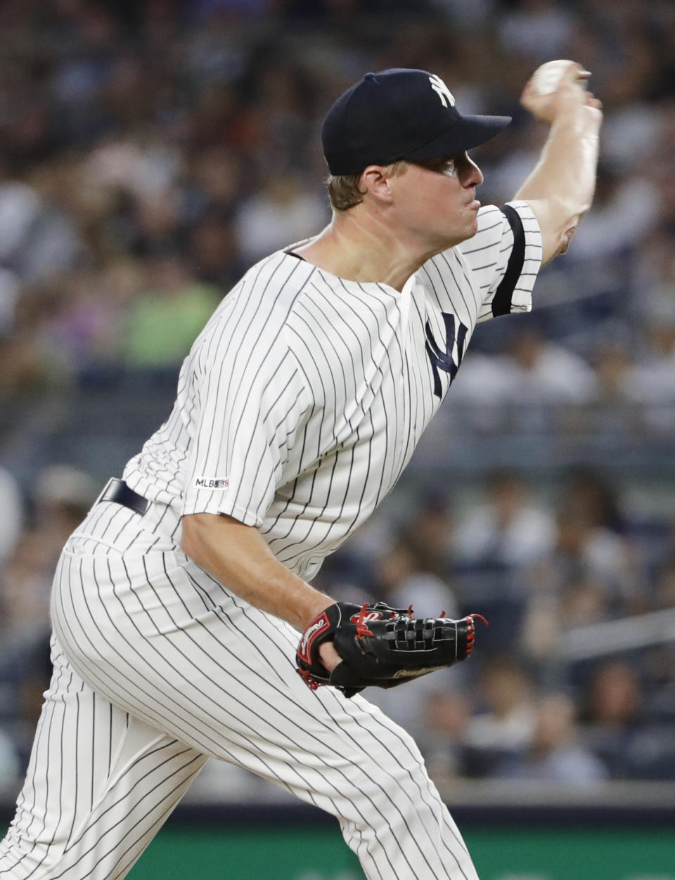 New York Yankees' Joe Mantiply delivers a pitch during the fourth inning of the second game of a baseball doubleheader against the Baltimore Orioles, Monday, Aug. 12, 2019, in New York. (AP Photo/Frank Franklin II)