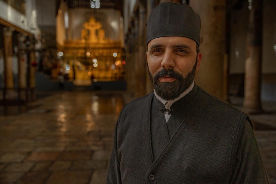 Father Issa Thaljieh, the Greek Orthodox parish priest (Bel Trew/The Independent)