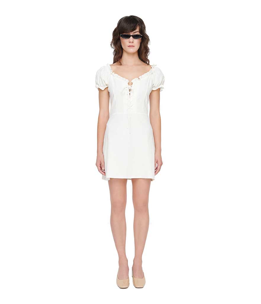 Sleek and minimal white lace up dress. (Photo: Genuine People)