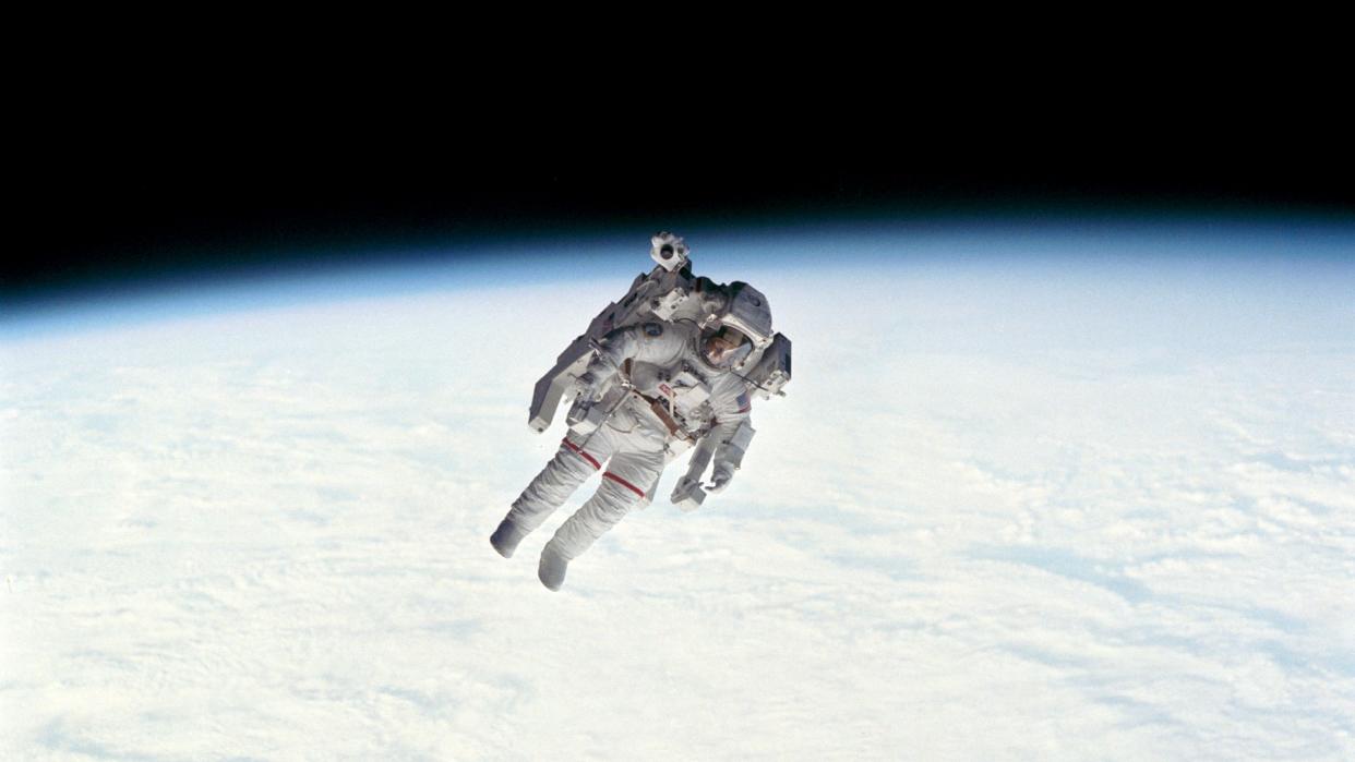  Astronaut Robert Stewart during Manned Maneuvering Unit (MMU) Exercise untethered above the Earth.February 11, 1984. 