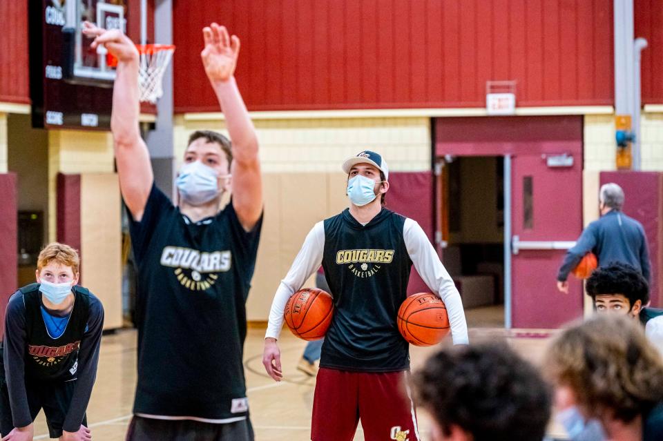 Old Colony assistant coach Jake Jason watches the team at practice.