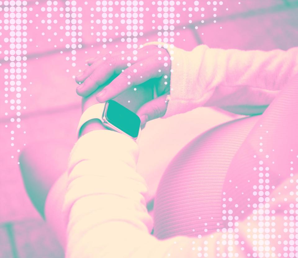 pregnant woman wearing a digital watch