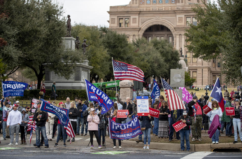 FILE - In this Jan. 6, 2021 file photo, supporters of President Donald Trump gather while protesting the election at the Capitol in Austin, Texas. Republicans have had wild success this year passing voting restrictions in states they control politically, from Georgia to Iowa to Texas. (Jay Janner/Austin American-Statesman via AP, File)