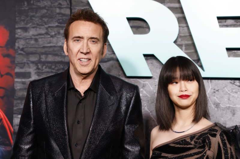 Nicolas Cage, seen with wife Riko Shibata, stars in "Dream Scenario." File Photo by John Angelillo/UPI