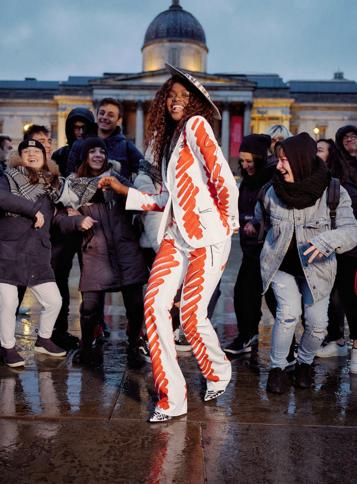 <p>Silver in a Moschino Couture jacket, trousers, hat, and pumps. Photographed by Charlotte Hadden.</p>