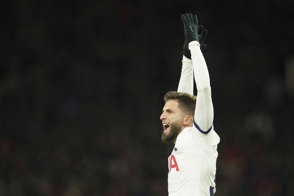 Tottenham's Rodrigo Bentancur celebrates after scoring his side's second goal during the English Premier League soccer match between Manchester United and Tottenham Hotspur at the Old Trafford stadium in Manchester, England, Sunday, Jan.14, 2024. (AP Photo/Dave Thompson)