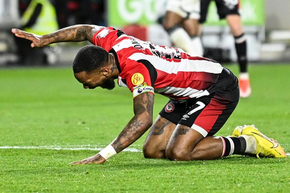 Ivan Toney slams the floor in frustration (AFP via Getty Images)