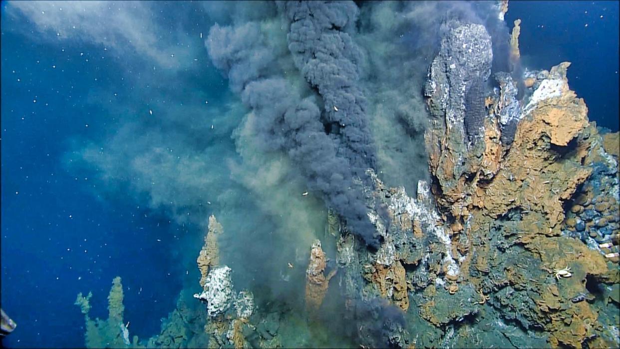  Here we see a volcanic hydrothermal vents on the ocean floor. Hot material is rising from it. 