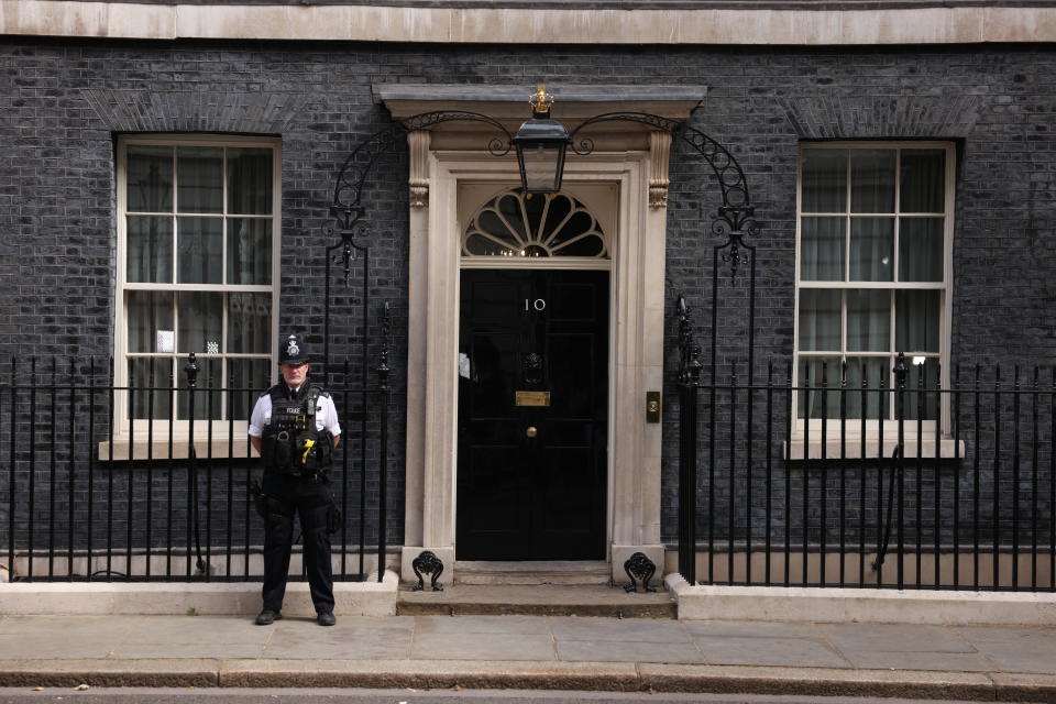 A policeman stands at the entrance of No. 10 Downing St. in London, the residence and office of the British prime minister.