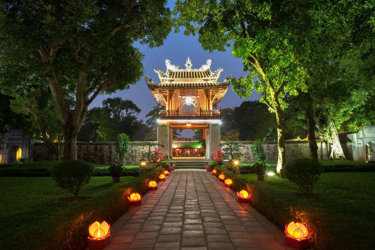 khue van cac ( stelae of doctors ) in temple of literature ( van mieu ) at night