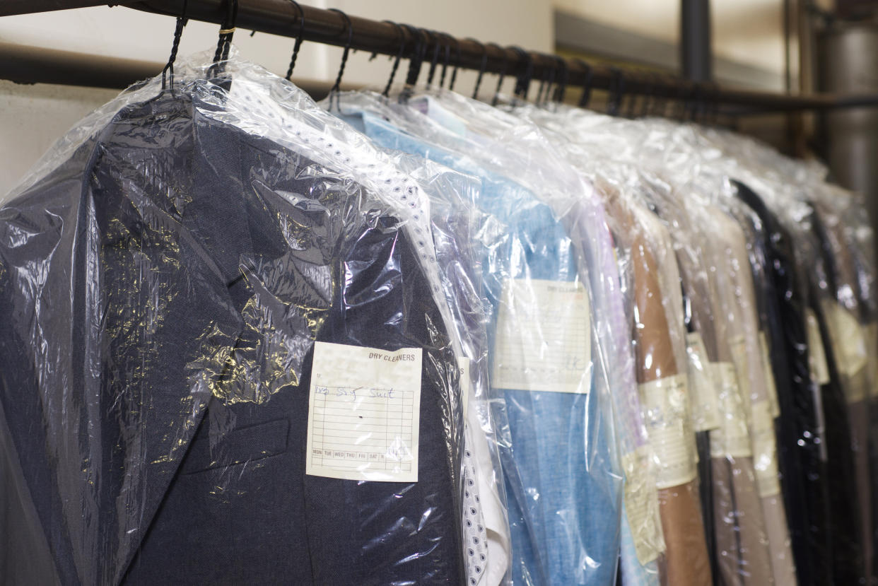 The chemicals used in dry cleaning don't kill viruses, but the heat applied during pressing and ironing can. (Photo: artwell via Getty Images)