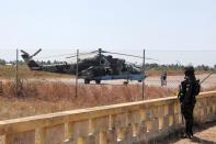 An attack helicopter is seen in the Mocimboa da Praia airport