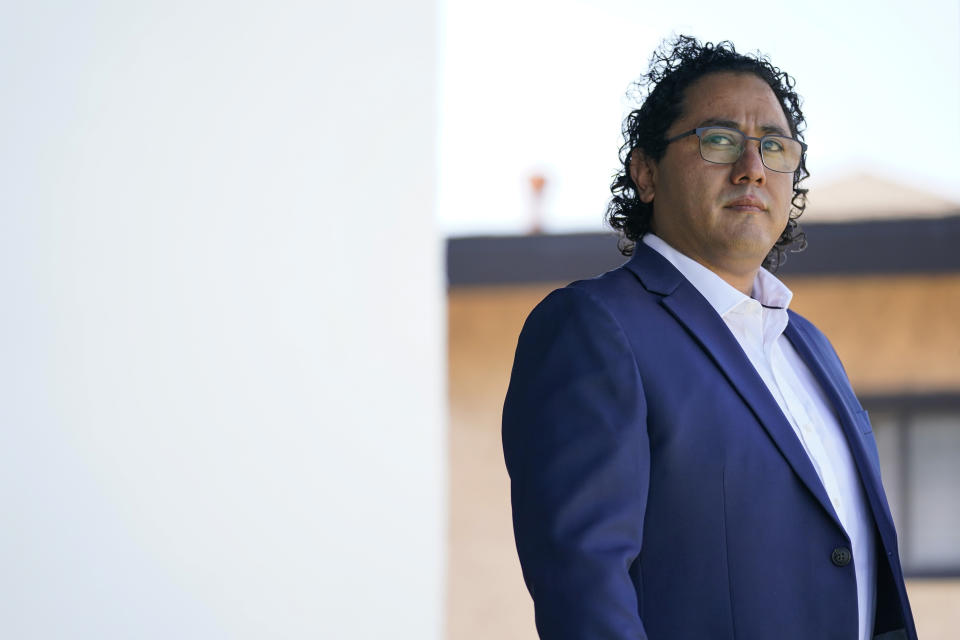 Frankie Guzmán, director of the California Youth Justice Initiative at the National Center for Youth Law, stands outside his home Tuesday, June 27, 2023, in Long Beach, Calif. California has moved responsibility for youth prisons to the county level, the final step toward local control in a yearslong reform effort aimed at keeping young offenders closer to home and prioritizing rehabilitation over punishment. “At the local level we just don’t have the programs and services, or the culture, that’s ready to handle to the kids with real needs, those dealing with serious trauma,” said Guzmán. (AP Photo/Ashley Landis)