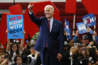 FILE - In this March 9, 2020, file photo Democratic presidential candidate former Vice President Joe Biden speaks during a campaign rally at Renaissance High School in Detroit. White House contenders aren't typically bashful about asking for money. But as the coronavirus pandemic upends life, President Donald Trump and his likely Democratic rival, Biden, suddenly find themselves navigating perilous terrain. (AP Photo/Paul Sancya, File)