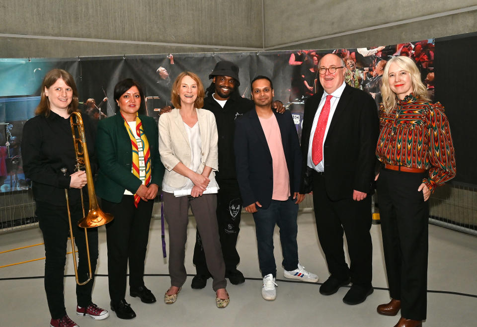 Helen Vollam, Rokhsana Fiaz, Lyn Garner, Hak Baker, Ahmed Hussain, Alan Davey and Justine Simons celebrate the topping out of the BBC’s new music studios (Mark Allan/BBC/PA)