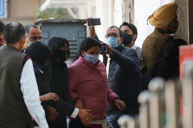 Disha Ravi, a 22-year-old climate activist, arrives to a court in New Delhi