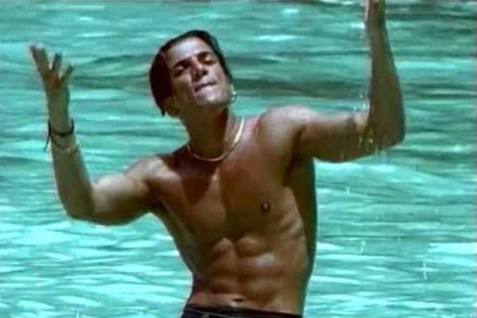 The star was more famous for his six-pack than he was for his music (Peter Andre/Mysterious Girl/Official Video)