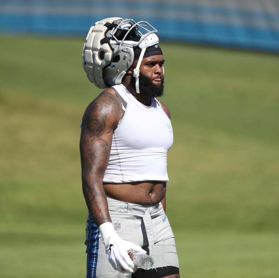 Detroit Lions defensive lineman Austin Bryant walks off the field after practice Friday, July 29, 2022, at the Allen Park practice facility.