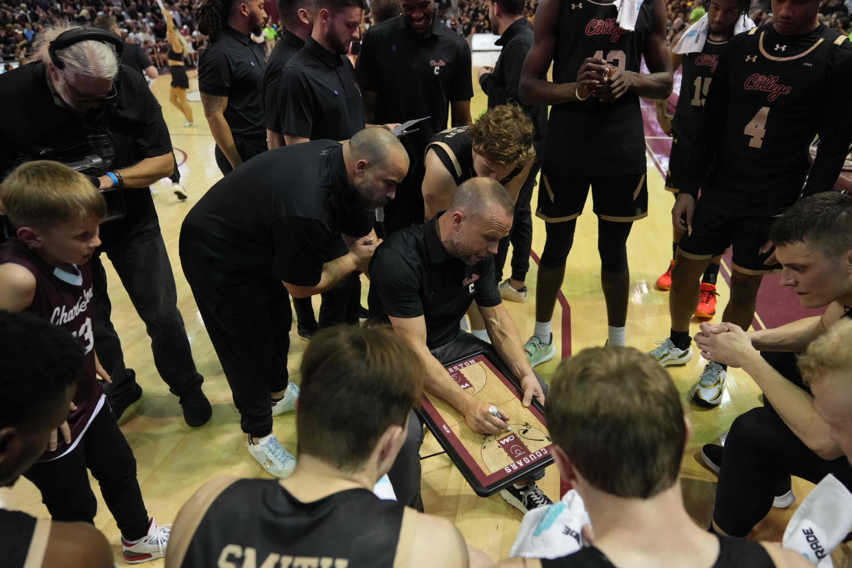 Feb 23, 2023; Charleston, South Carolina, USA; Charleston Cougars head coach Pat Kelsey talks with his team during a time out in the second half against the Towson Tigers at TD Arena. Mandatory Credit: David Yeazell-USA TODAY Sports