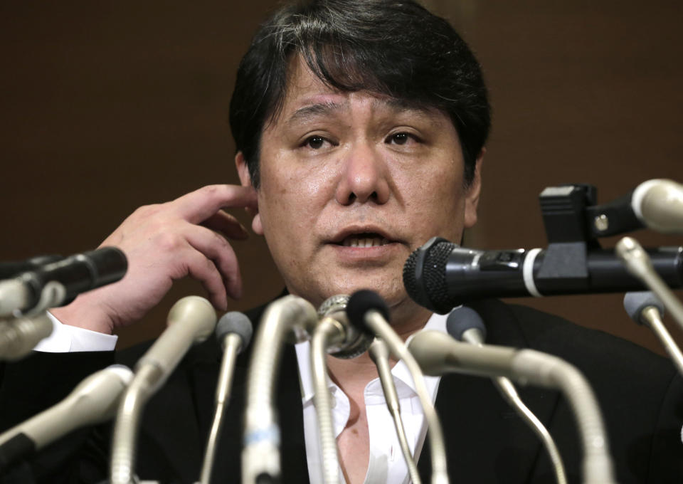 Mamoru Samuragochi speaks during a press conference in Tokyo, Friday, March 7, 2014. The man once lauded as "Japan's Beethoven" bowed repeatedly and apologized Friday at his first media appearance since it was revealed last month that his famed musical compositions were ghostwritten and he wasn't completely deaf. (AP Photo/Shuji Kajiyama)