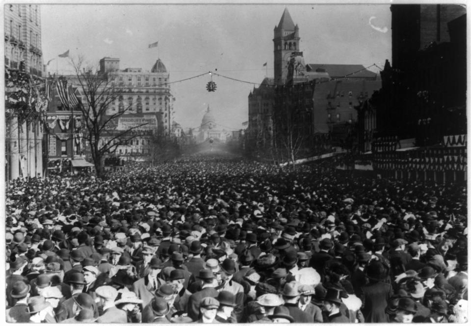 In this photo provided by the Library of Congress, taken in 1913, shows parade and enormous crowd on Pennsylvania Ave. looking toward Capitol past old Post Office, in Washington. Thousands of women take to the streets of Washington, demanding a greater voice for women in American political life as a new president takes power. This will happen on Saturday, Jan. 21, 2017, one day after the inauguration of Donald Trump. This DID happen more than 100 years ago, one day before the inauguration of Woodrow Wilson. (Library of Congress via AP)