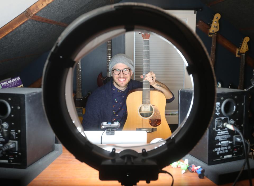 Music teacher Jeff Klemm in his studio in Cuyahoga Falls.