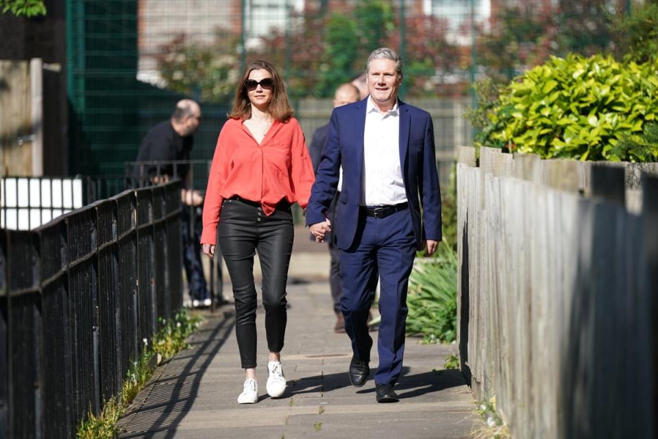 Labour leader Sir Keir Starmer and his wife Victoria arrive to vote at a polling station in Kentish Town, north London (Aaron Chown/PA) (PA Wire)