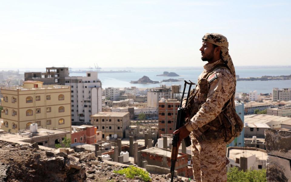 A militiaman of the separatist Southern Transitional Council (STC) in south Yemen patrols a street after the STC declared self-rule in the southern port city of Aden in April  - Najeeb Almahboobji/Shutterstock